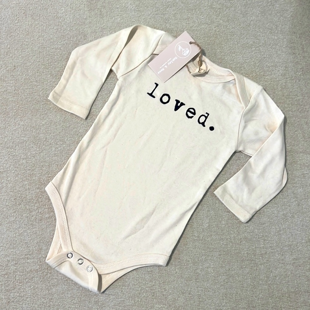 Tenth &Pine long-sleeve “loved.” Onesie